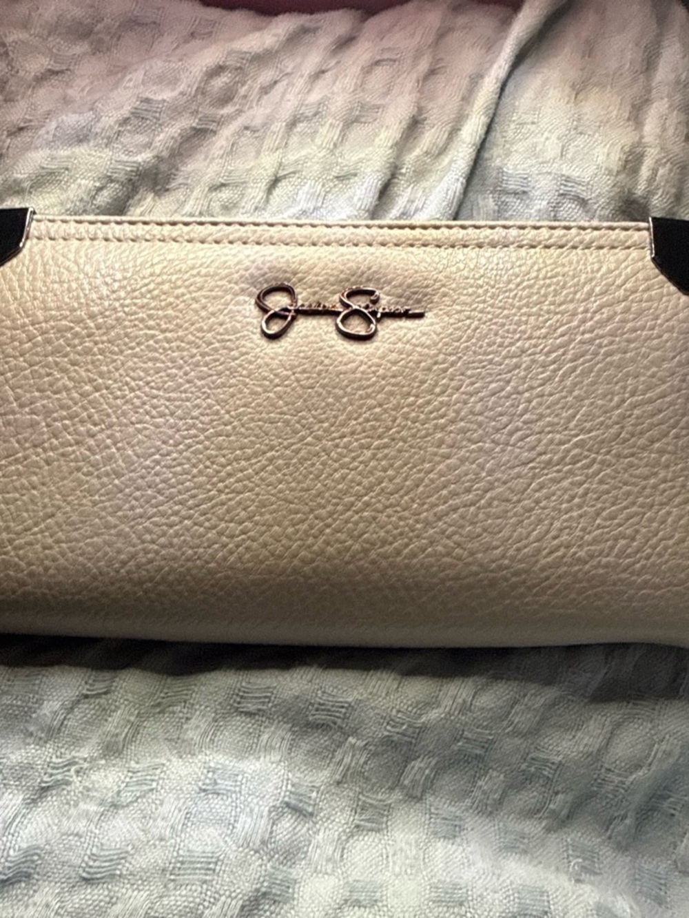 Jessica Simpson Cream Pebbled Leather Logo Clutch with Black Corner Accents